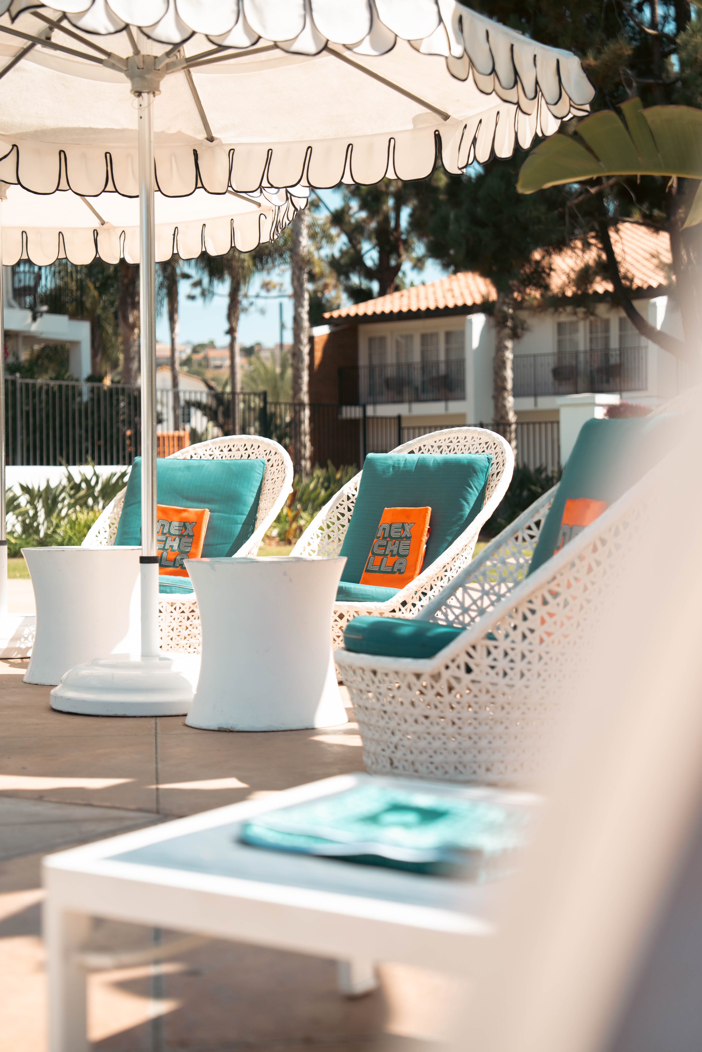 man walking in front of textured wall